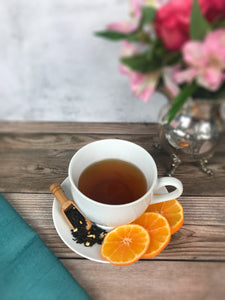 PILATEA's Black and Pu'erh tea blend with citrus and vanilla representing the Pilates Principle, Concentration.